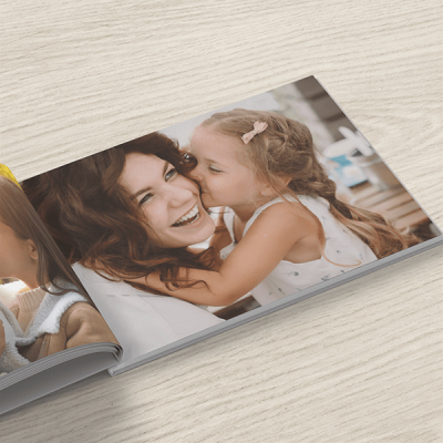 Capture cherished memories in a beautiful photo book.
